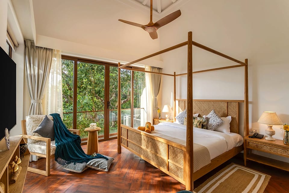 Casa Keval, four-poster bed and garden outlook