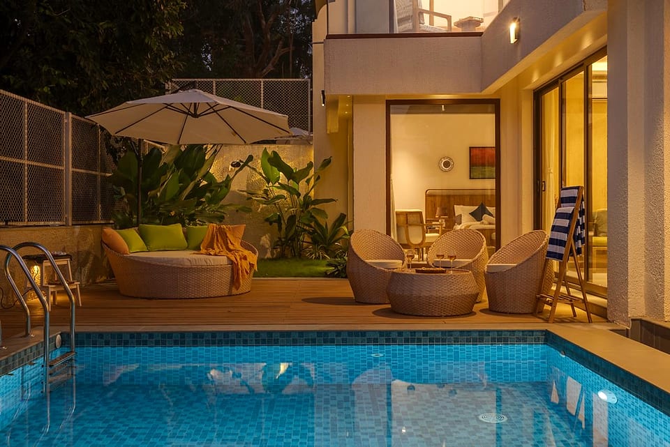Casa Keval, pool lit at dusk