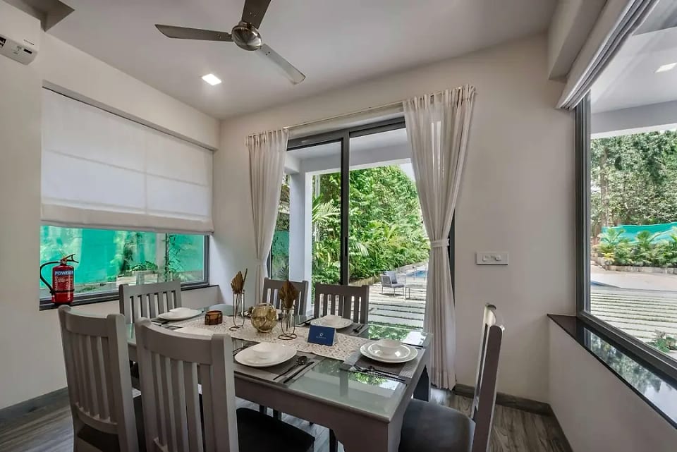 Nerul residence, dining table looking out to the pool